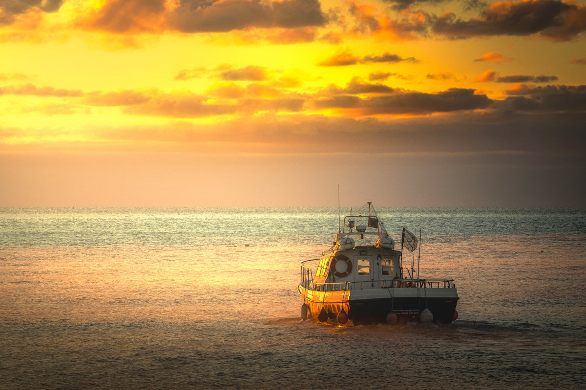 A Fisherman's Sky – fishing boat at sunset off West Bay