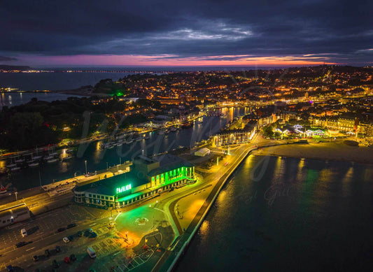 Aerial view of Weymouth harbour and Pavilion illuminated after dark
